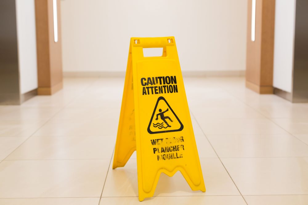 Caution Wet Floor Sign in a Hallway