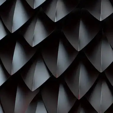 Repeating geometric pattern of overlapping triangular shapes creating a textured surface.